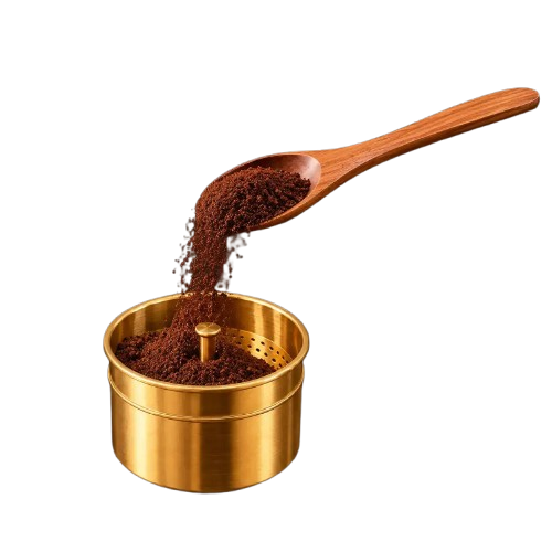 Filter coffee powder being added to the coffee filter