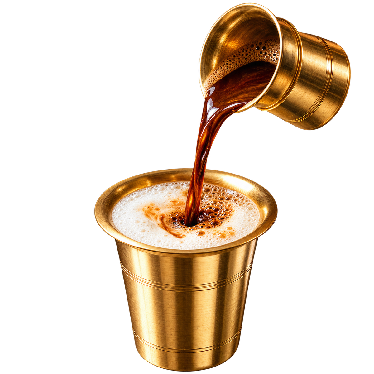 South Indian filter coffee being frothed between tumbler and dabara
